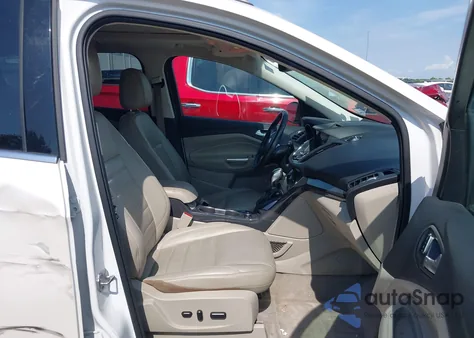 2016 Ford Escape Titanium from USA, damaged, VIN 1FMCU0J96GUA96889